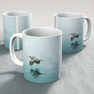 Heron over still waters, Mug by Charlotte Strawbridge